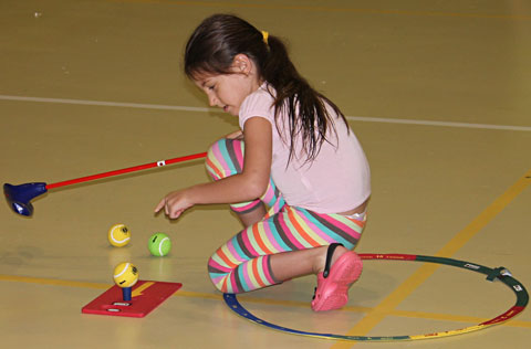 SNAG girl teeing off